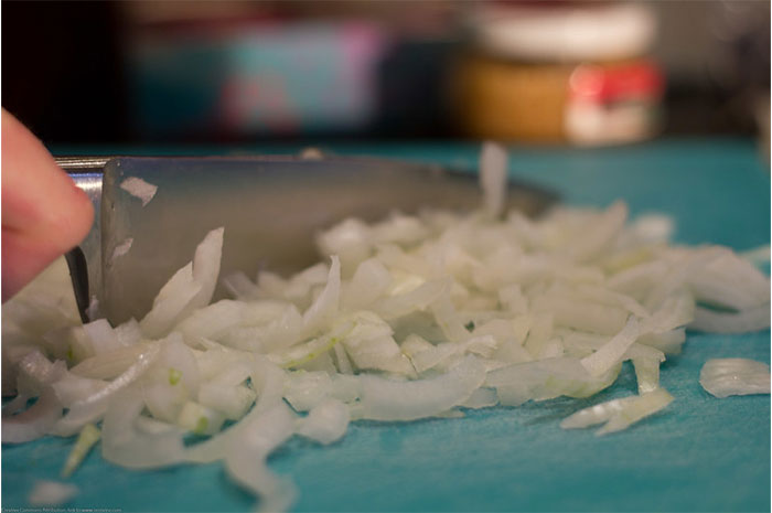 If you're using raw, chopped onions in a dish, soak them in cold water first to draw out some of that bite. It's a really small thing, but it can make a world of difference