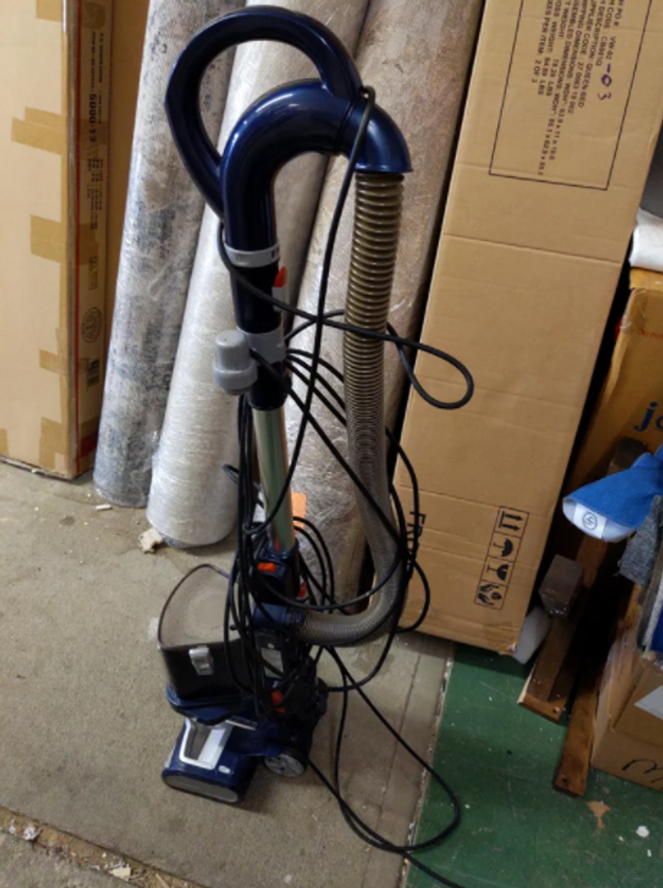 “This is how my boss puts the vacuum away.”