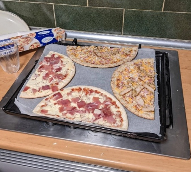 If you have a small oven, you can cut your pizza in halves and place them like this: