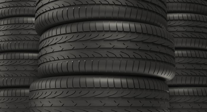 The rubber tires on a vehicle will insulate you from the ground and protect you from lightning. Lightning doesn’t stop for 2″ of rubber, tho the car will act like a faraday cage and protect you from the electrical current unless you’re in a convertible, a motorbike or any other vehicle that doesn’t cover you in all directions.