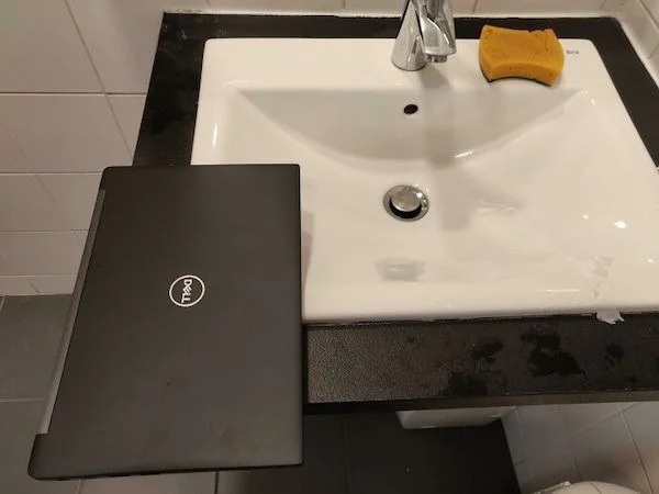 How my coworker puts his laptop while he washes his hands.