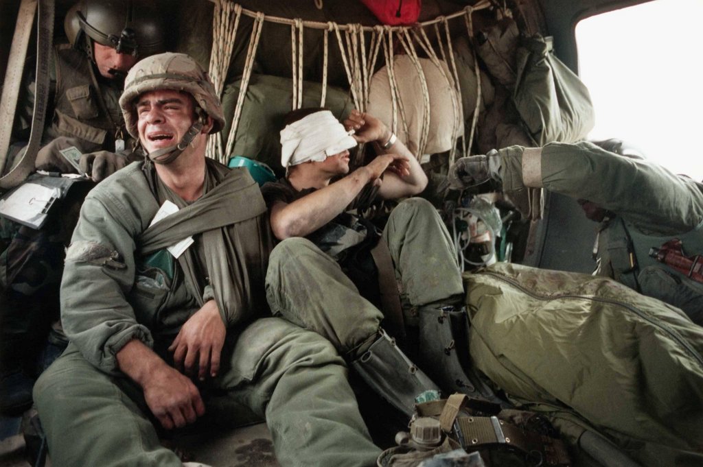 US Soldier Ken kozakiewicz breaks down after his friend is pronounced dead beside him during a friendly fire attack