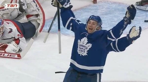 perfectly timed photos -  Michael Bunting - Tsn Rque Tal Toronto Haple Leafs