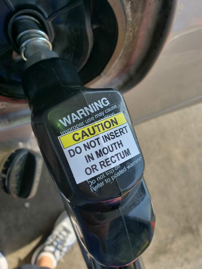 hilarious signs for stupid people --  vehicle - Warning Improper use may cause dition Caution Do Not Insert In Mouth Or Rectum Do not top of Refer to posted warning