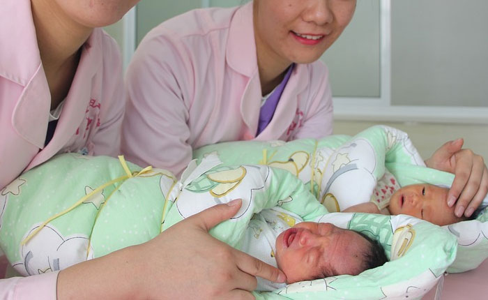 Holding a pair of dying twin boys so they wouldn't die alone.
Their mother hadn't wanted the pregnancy, hadn't even told anyone she was pregnant, so it was a bit of a blessing when she went into preterm labor and delivered them 4 months early.
She was relieved to not have to raise twins on her own and didn't want anything to do with her sons. 22 weeks is too early to live very long, but they were alive long enough to have some consciousness, some awareness and I couldn't bear the thought of them spending their whole short little lives cold and alone. I took them to another room and kept changing their blankets to keep them warm and comfortable until their chests finally stopped moving a couple of hours later. I sang to them "you are my sunshine" and then tucked their little bodies away in the morgue, and clocked out. As an obstetric nurse, I deal with the very best and worst in people. I love my job, but my heart broke that day. All the wonderful happy days at work just barely make up for the days like that one. tl;dr - don't get paid enough to show someone else's kids the only love they'll ever know in their very short lives.