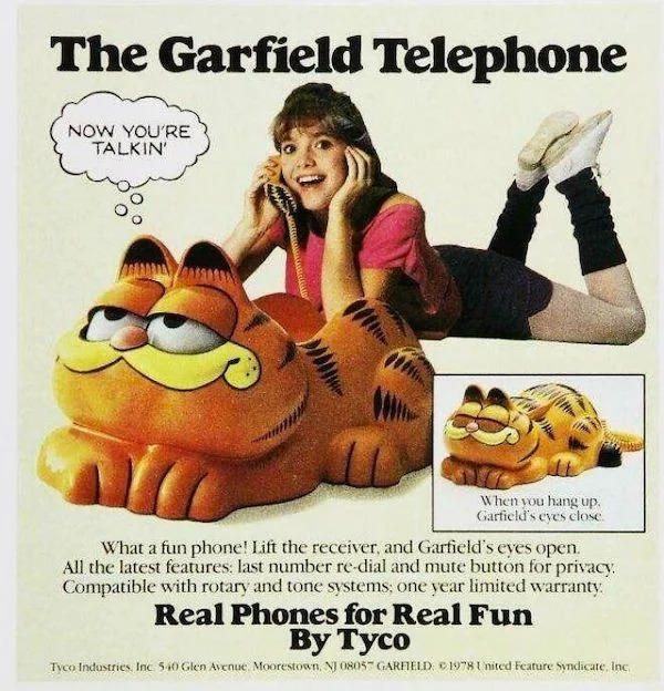 vintage ads - garfield phone beach - The Garfield Telephone Now You'Re Talkin' When you hang up. Garfield's eyes close. What a fun phone! Lift the receiver, and Garfield's eyes open. All the latest features last number redial and mute button for privacy. 