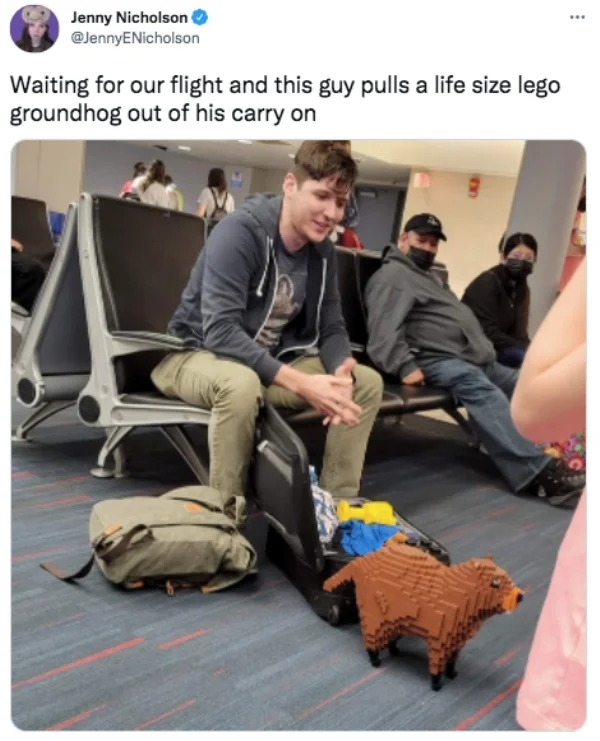 funny tweets - sitting - Jenny Nicholson Waiting for our flight and this guy pulls a life size lego groundhog out of his carry on