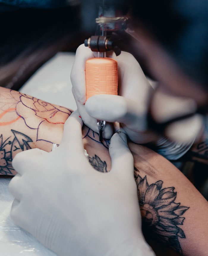 I'm a tattoo artist in Saskatchewan, Canada and I don't think most people know this, but you don't need any kind of certification to tattoo. The only thing legally I'm required to have to be able to run my business is have access to a sink in the same room. If I don't want to take my Bloodborne Pathogens Certification, if I don't want to do any extra kind of, like, educational steps for me to legally tattoo, I don't have to. No one is checking up on you. There's no one that's, like, checking in to make sure you're doing procedures correctly. And I just think that's really wild even in the industry. The amount of people that I've worked with that I've never seen them wash their hands and they don't have Bloodborne Pathogens Certification, which is literally the bare minimum, is astounding. So that's why I always say, check your artists and make sure you can vet them. And if you can get someone to say that they've worked with them and they're great and they're good at what they do, then that's even better.