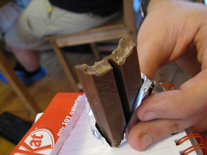 My friend was like, "Want a Kit-Kat?" I said sure. He proceeded to unwrap the candy bar, set it on a plate, and then put it in the microwave until the chocolate had melted off the wafers. I was freaked out and said I don't need mine microwaved. He looked shocked and said, "You eat them raw?!"