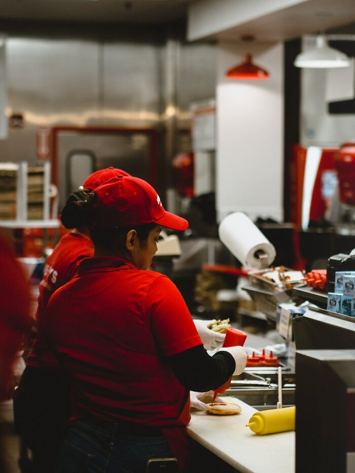 America. Fast food places usually ask if you want a large or super size drink. They also have free refills. Just get the regular size.