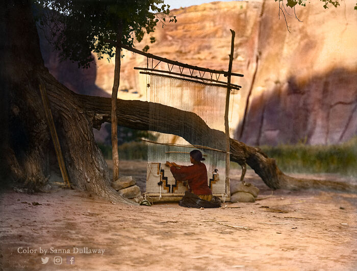 colorized photos from history - “The Blanket Weaver” - A Navajo Woman Weaving Under A Cottonwood Tree In Canyon De Chelly, Arizona. Photographed By Edward S. Curtis In Ca. 1905