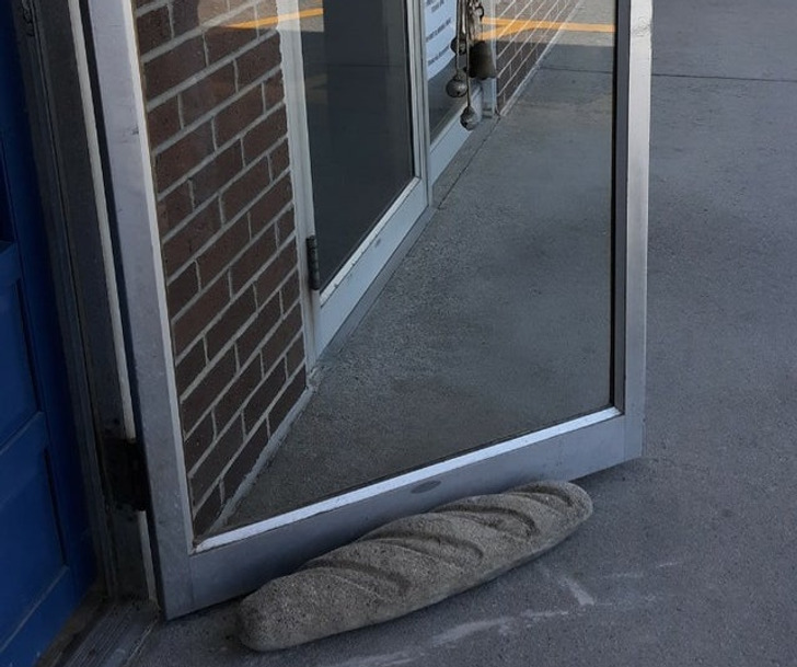 “This bakery has a large cement loaf of bread as a door stopper.”