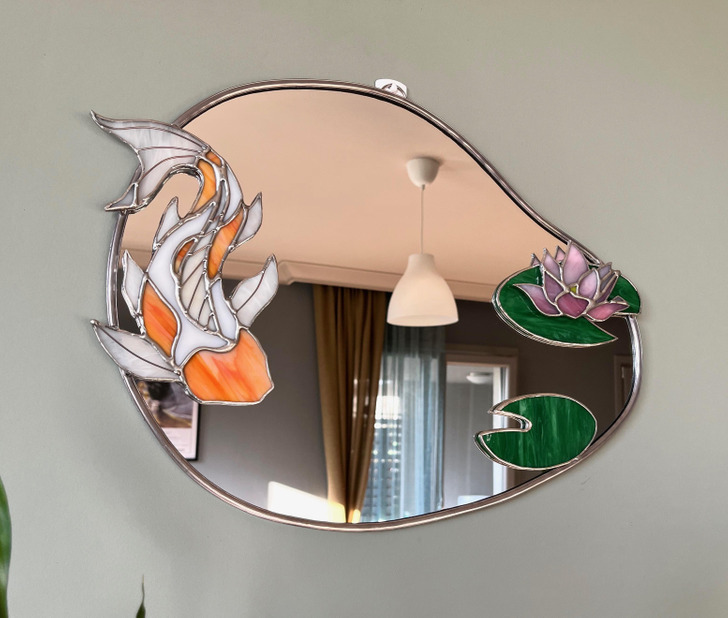 “I made this koi pond design stained glass mirror.”