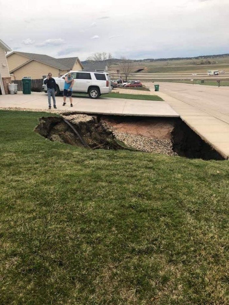 Residential homes built in South Dakota over undisclosed abandoned gypsum mine… sinkhole renders entire neighborhood’s property values now worthless.