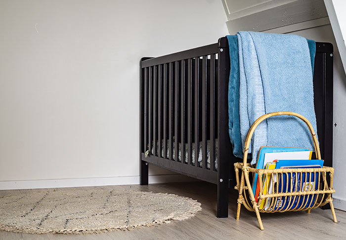 My 1 year old son's empty room after his mother and I split up. We planned on 50/50 custody but she took everything. I closed the door and didn't open it for the three months that I had to live there. I came from a broken home and promised myself I'd never do that to my child; I'd felt like such a failure.