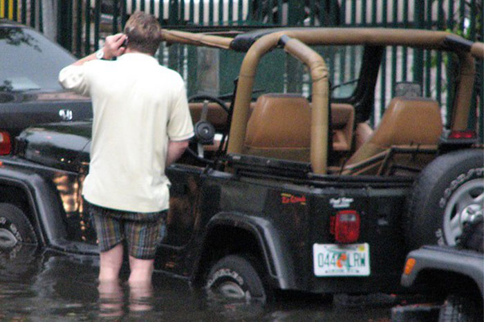 I came out from work on a heavy rain day in late autumn to find my new used car flooded. The sun roof didn't seal properly and leaked. A lot. At first I didn't notice because I had parked facing downward on a hill. I started up the car, pulled out, and, upon hitting level ground, a four inch wave of icy cold water sloshed over my feet from under the dash. I couldn't get my head around it, just couldn't grasp what was happening. Stopping in the middle of traffic, I just sat there staring down at the wading pool on the floor of my new used car. After a few moments someone honked, so I drove home.

Yes, I knew I should go directly to the dealership, or a repair shop, or somewhere other than my own garage. But I didn't. I drove across town with water sloshing back and forth around my feet like in a sinking ship. I remember laughing out loud at one point, thinking, "Maybe I can dry it out with the leaf blower."

In the end, I sucked it out with the shop vac and manhandled a full-sized dehumidifier into the backseat, rigged up to extension cords to run all night. I went out every couple of hours to empty it, and the next day I parked it in the sun and left all the windows down.

After a few days it was dry, so I took it in to have the sunroof repaired. To this day I have no idea why I didn't want anyone to know what happened. It's not as if it were my fault or anything. Maybe just that the experience was so weirdly surreal that I couldn't break the spell.