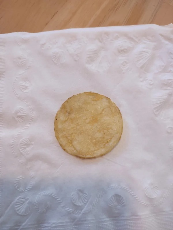A particularly round potato chip.