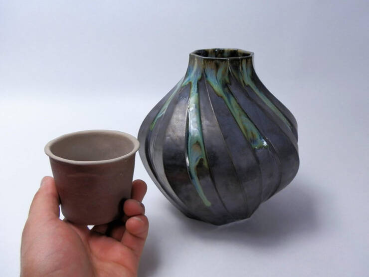 “My latest ceramic project next to my first one, 2 years worth of progress”