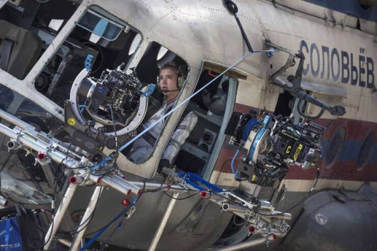 behind the scenes movies - Florence Pugh prepares to take flight(?) on the set of Black Widow (2020).