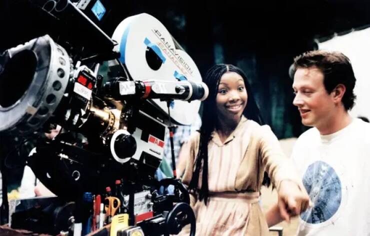 behind the scenes movies - Brandy Norwood looks every part a princess behind the scenes, too, while filming Rodgers & Hammerstein's Cinderella (1997).