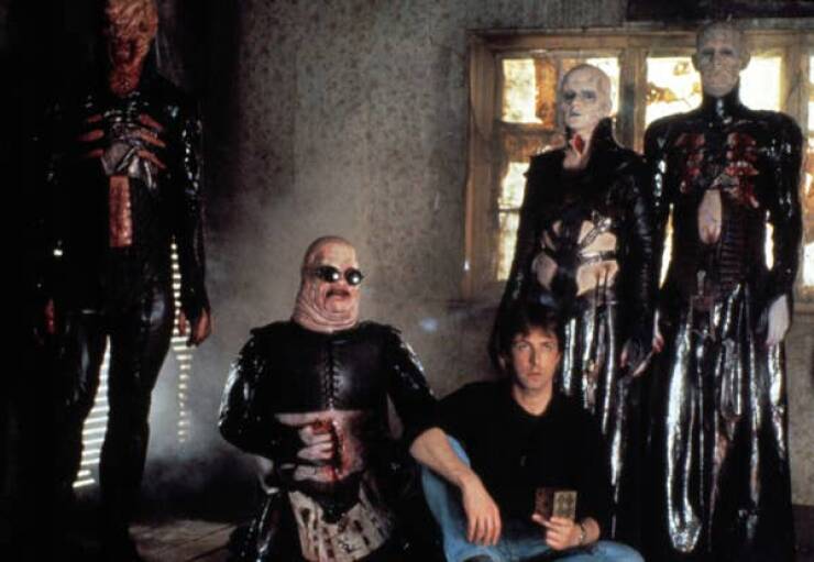 behind the scenes movies - Clive Barker chilling with his sick-lookin' cenobites on the set of Hellraiser (1987). Honestly? Squad goals.