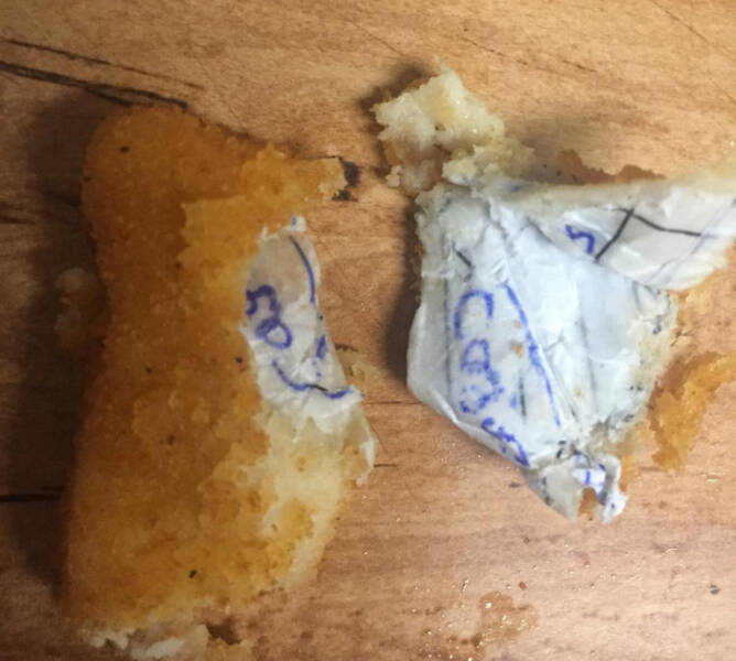 “My friend bought chicken nuggets and got one with a piece of cardboard with writing on it.”