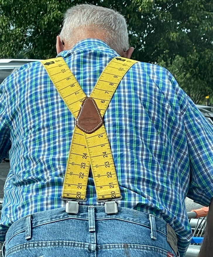 “This gentleman’s suspenders are designed to look like measuring tape.”