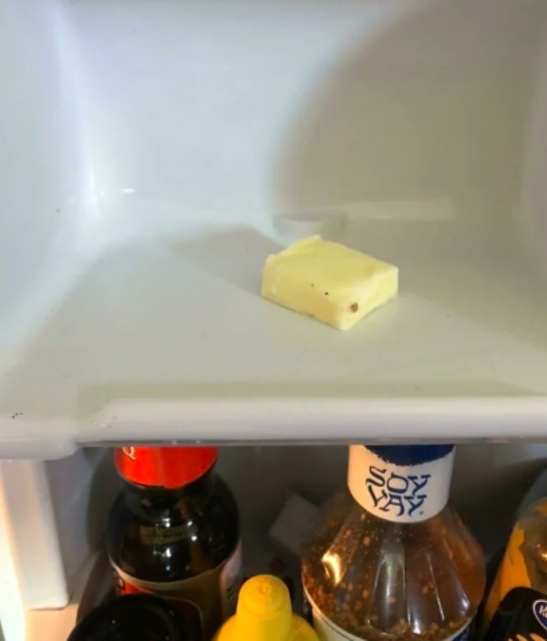 “My Boyfriend Puts The Butter Away Like This In The Fridge Door. Fully Exposed And Touching The Fridge I Haven’t Washed In Months”