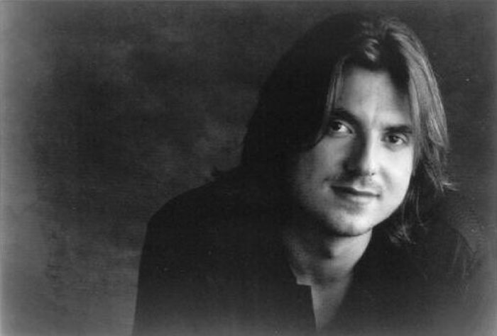 I went to see Mitch Hedberg do stand up. We stayed around awhile hoping to see him leaving. He never materialized though, so my husband and I walked towards our car. As we were walking we heard a woman yell from an ally “Hey! Mitch Hedberg is back here signing autographs!” We walked around the corner behind a scary old building. It was like 1am and pretty dark. There was Mitch Hedberg and no other fans. Just him and his wife, who had been the one to yell about autographs. He was very high and super lovey. He hugged my husband and me and told us what his fans mean to him. HE took pictures of US for his scrapbook page online. He was also hilarious. We were just there behind a building at 1am with Mitch Hedberg and his wife laughing and hugging deep into the wee hours… When I tell people this they go silent and I’m not sure why. I figure they don’t believe it.