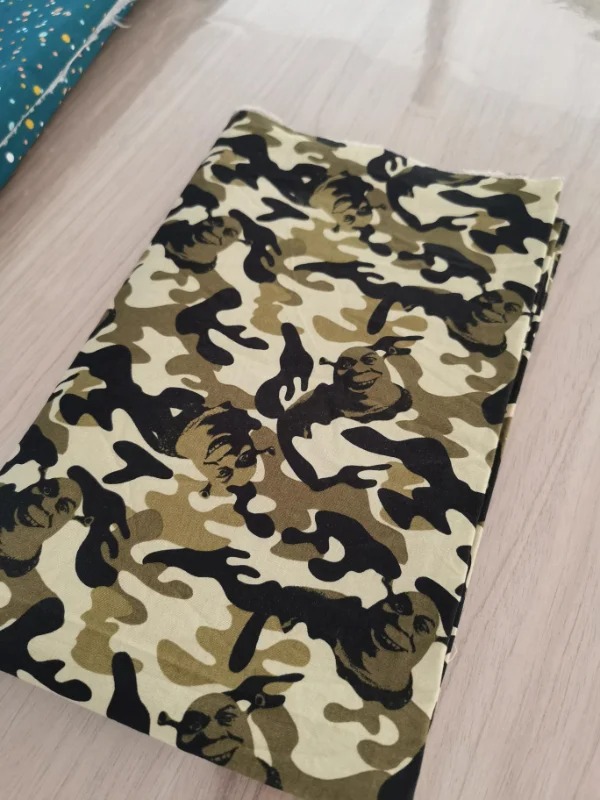 fascinating photos  - This camo printed fabric has unexpected shreks in it