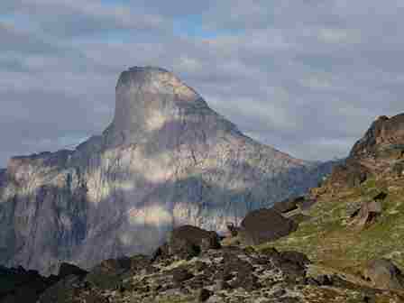 Mount Thor in Canada has the world's longest vertical drop. If you fell off it, you would fall for over a kilometer before you hit anything