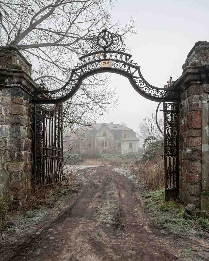 fascinating places - The Entrance Gate To An Abandoned Mansion In Poland