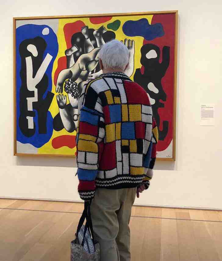 “Couldn’t help but snap a picture of this man at the Art Institute. Spoke to him a little later and he said he designed and knit the cardigan himself.”