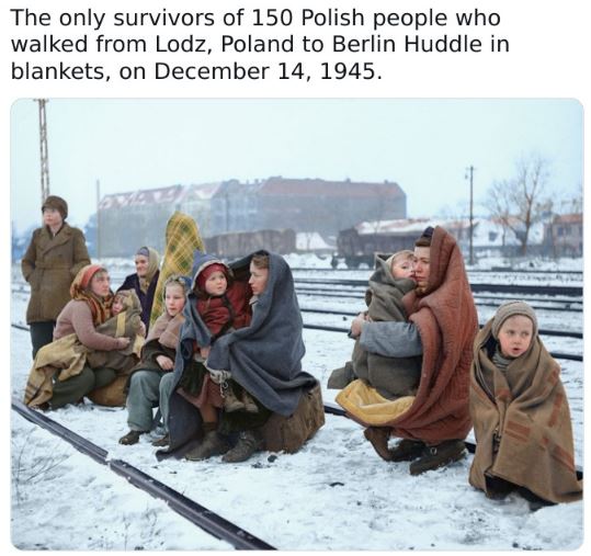 colorized historical photos - berlin christmas 1945 - The only survivors of 150 Polish people who walked from Lodz, Poland to Berlin Huddle in blankets, on .