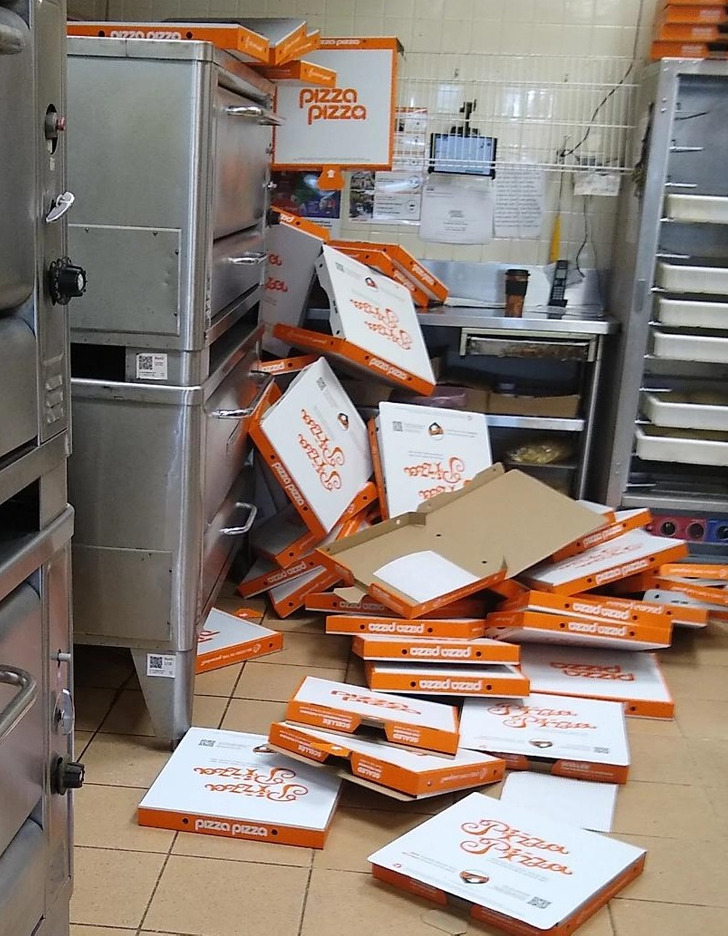 “The shelf holding the extra large pizza boxes came loose.”