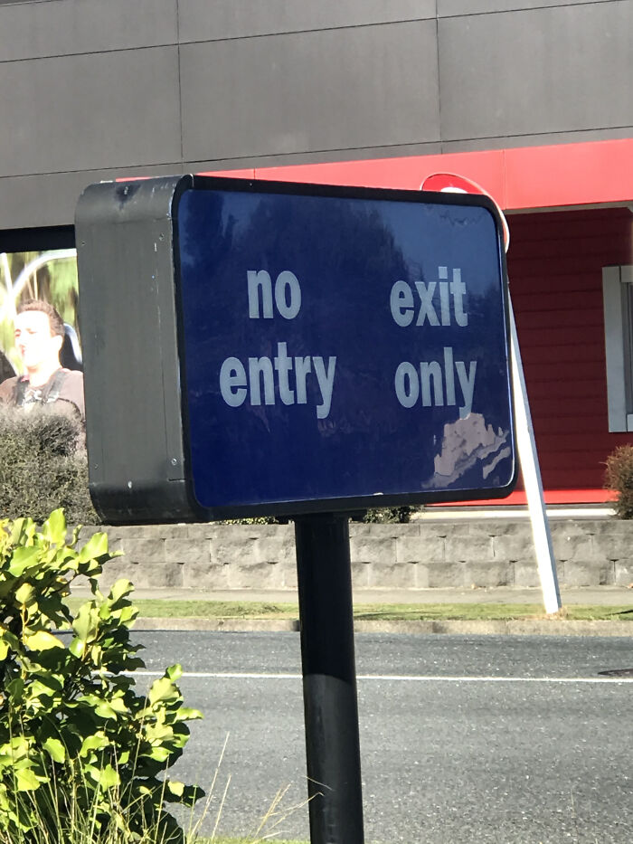 poorly designed - street sign - no exit entry only