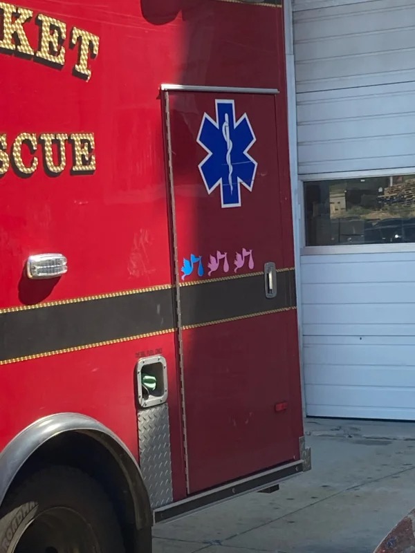 “This Ambulance has stork decals, one for each of the babies born in the back”