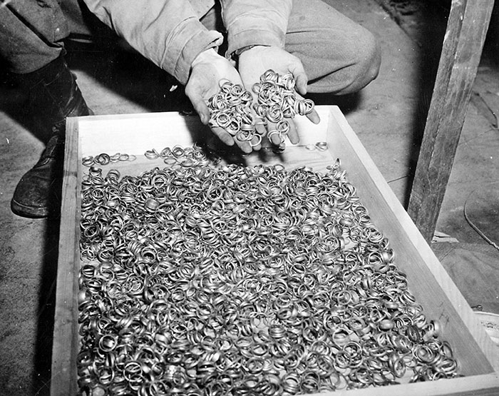 A Few Of The Thousands Of Wedding Rings The Germans Removed From Holocaust Victims To Salvage The Gold. The U.S. troops found rings, watches, precious stones, eyeglasses, and gold fillings, near Buchenwald concentration camp. 1945 May 5.