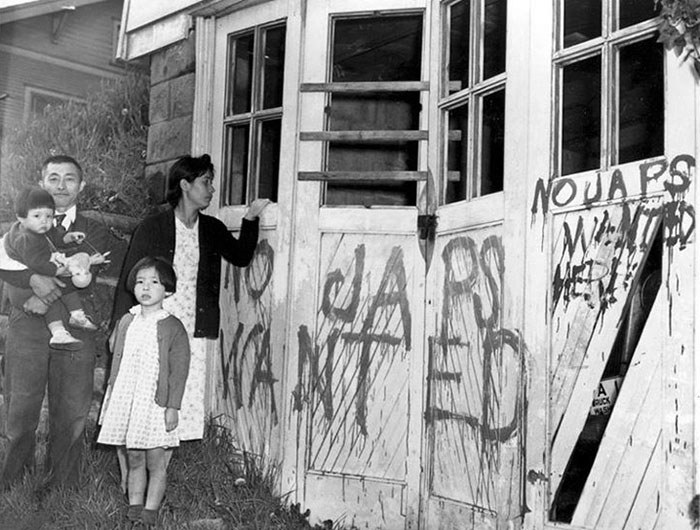 A Japanese Family Returning Home (Seattle, Washington) From A Relocation Center Camp In Hunt, Idaho On May 10, 1945