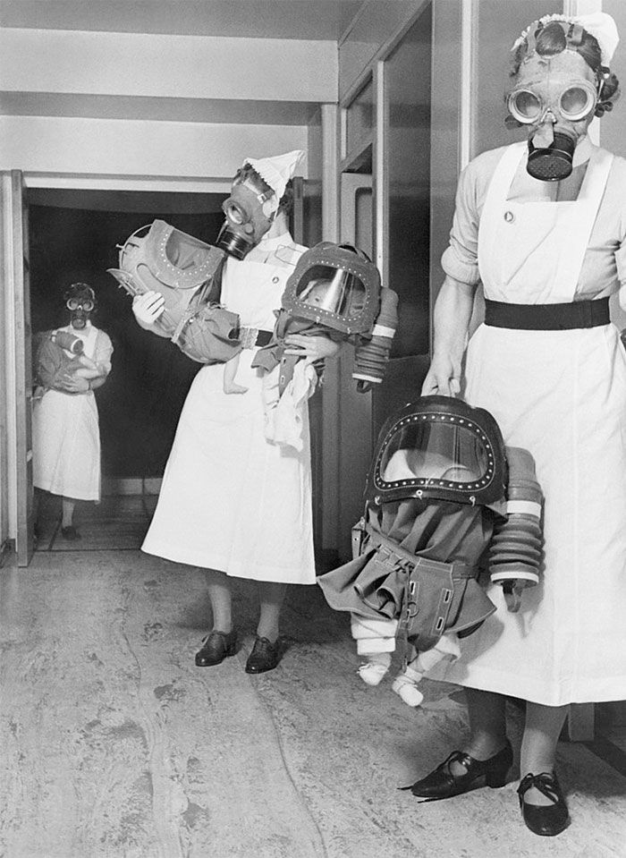 WWII Gas Masks For Babies. Throughout World War II, the threat of chemical warfare frightened citizens and soldiers across Europe. To prepare for a possible gas attack, civilians could have protected themselves with gas masks. But what about children and infants who were too small to wear a conventional mask? This eerie 1940 photograph shows nurses testing out new “gas masks” for babies.