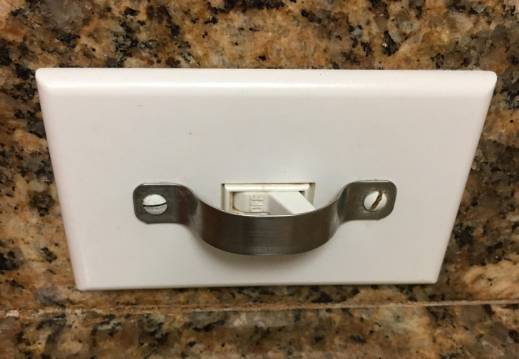 An accident-proof garbage disposal switch"