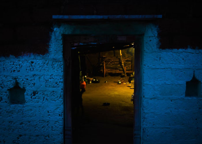 Friend's new house had a large basement. On one side, there was a really narrow doorway in the concrete that led to a small room, unfinished that was only large enough for maybe 4 people crammed in standing. The whole basement itself just felt super ominous, anyways. They said there had been a flood and the finishing had been torn out, to reveal it.