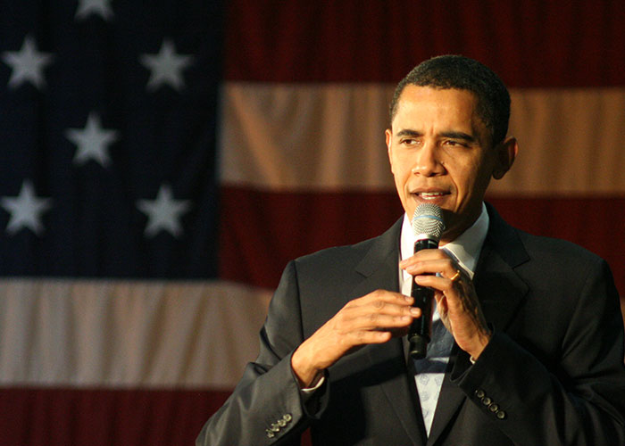 I was at an Obama rally back in August of 2007. We were at Florida A&M, in a smallish gym. We had shaken Obama's hand and talked to him a bit, and ended up following him back behind the barricade, talking to him. He ended up hugging us and all this stuff, but security was not too keen on it so they asked us to move.

Obama climbs up on the bleachers to take a picture with the band. Security ends up pushing me to move on the other side of the barricade (not hard, but it was crowded), and I fell forward.

I reached up to grab the first thing to stop my fall.

It was Barack Obama's a*s cheek.

He laughed.