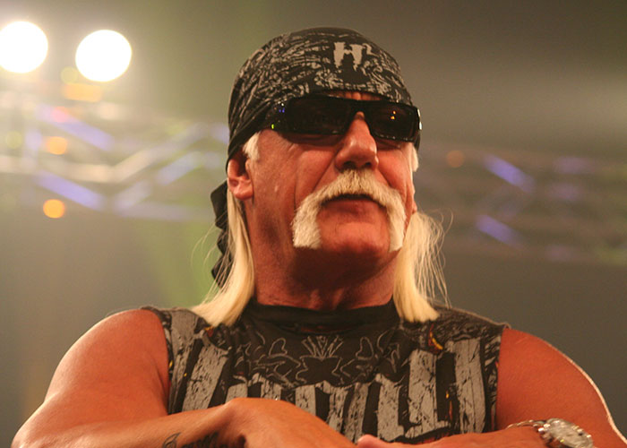 Hulk Hogan cut my friend in line at a barber shop. Not really a conversation but I imagine he was yelling something along the lines of "WHATCHA GONNA DO BROTHER WHEN THE HULKSTER HAS TO GET STYLED AND CUT BY SANDYYYYYY"