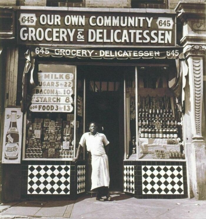 historical pictures - Harlem Grocer Standing In Front Of His Store, 1937