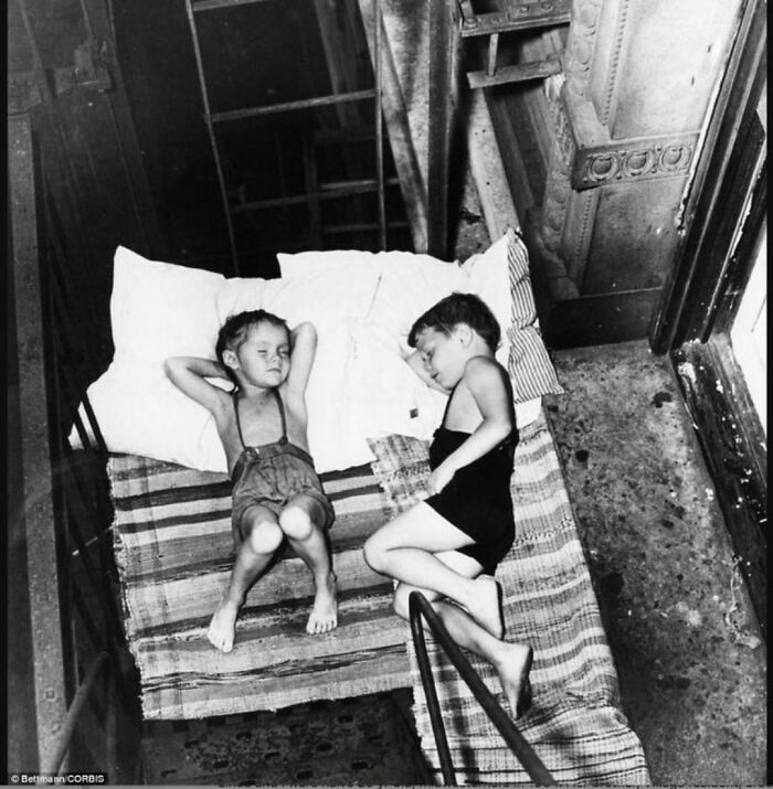 historical pictures - New York Children Sleeping On The Fire Escape To Keep Cool At Night. Early 1900 ‘S