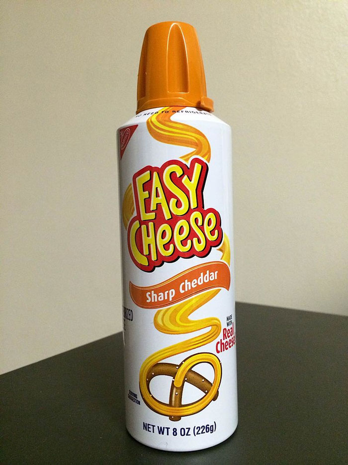 Tube cheese or aerosol cheese. The latter makes me gag thinking about it.