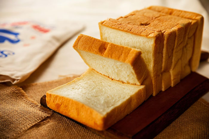 American bread. I lived in the states for six months. At one point shortly after moving, I bought a loaf of bread and made a sandwich. To my surprise, the bread was so sweet. I told my housemates that I accidentally bought dessert bread, but nope — just regular bread in America.