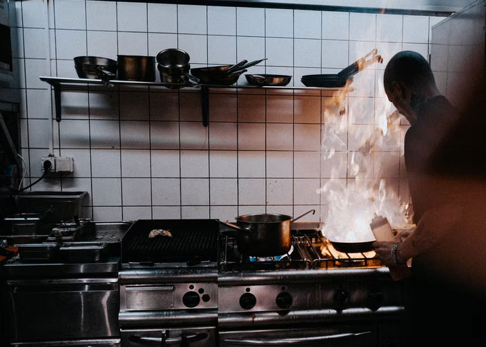shady business practices - cooking in dark kitchen