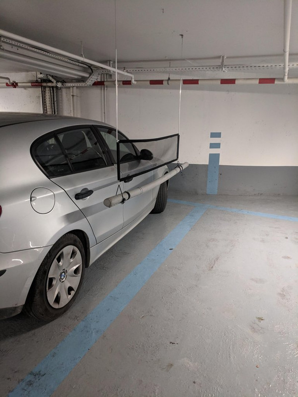 This car park in France has soft barriers between parking spaces to stop people scratching other cars.